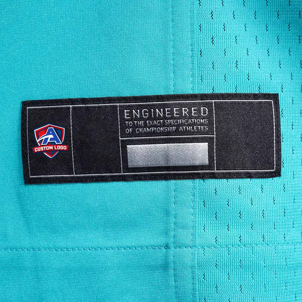 Product details tag of Custom Aqua Football Jersey showing stitched logos, fabric and customization options By Athletrio