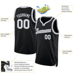 Product details of Custom Black White-Gray Round Neck Basketball Jersey showing stitched logos, fabric and customization options By Athletrio