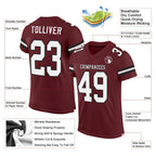 Product details of Custom Burgundy White-Black Mesh Football Jersey showing stitched logos, fabric and customization options By Athletrio