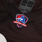 Product details v-neck of Custom Cleveland Brown Football Jersey showing stitched logos, fabric and customization options By Athletrio