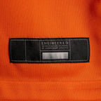 Product details tag of Custom Denver Orange Football Jersey showing stitched logos, fabric and customization options By Athletrio