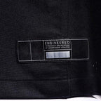 Product details Tag of Custom Las Vegas Black Football Jersey showing stitched logos, fabric and customization options By Athletrio