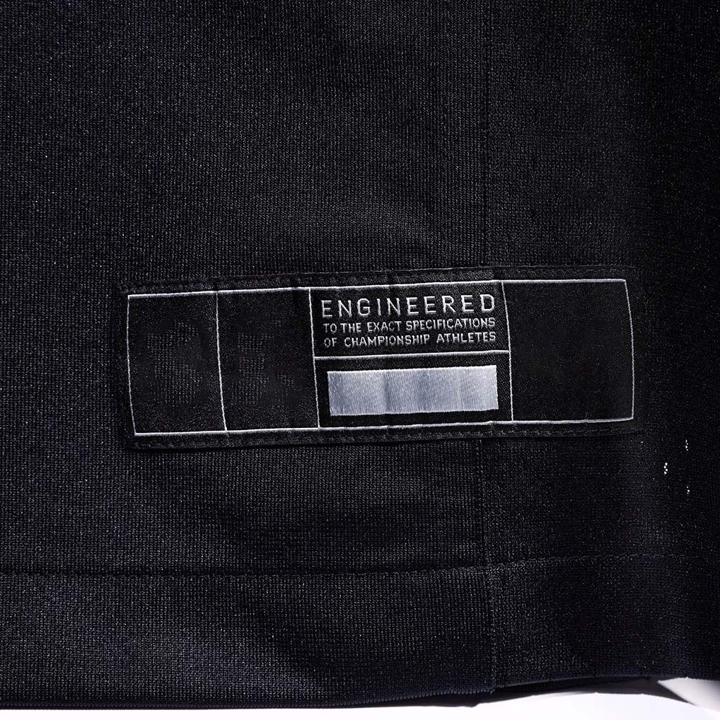 Product details Tag of Custom Las Vegas Black Football Jersey showing stitched logos, fabric and customization options By Athletrio