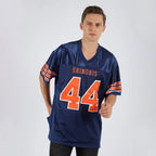Product details model of Custom Navy Orange-White Mesh Football Jersey showing stitched logos, fabric and customization options By Athletrio