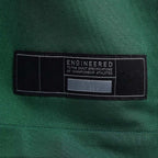 Product details tag of Custom New York Legacy Green Football Jersey showing stitched logos, fabric and customization options By Athletrio