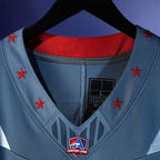 Product details Collar of Custom Storm Blue Football Jersey showing stitched logos, fabric and customization options By Athletrio
