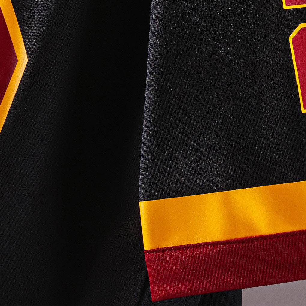 Product details Short-sleeve of Custom Washington Black Football Jersey showing stitched logos, fabric and customization options By Athletrio