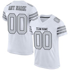 Angled view of Custom White Silver-Black Mesh Football Jersey – Designed By Athletrio