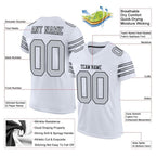 Product details of Custom White Silver-Black Mesh Football Jersey showing stitched logos, fabric and customization options By Athletrio