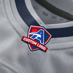 Product details neck of Custom Wolf Gray Football Jersey showing stitched logos, fabric and customization options By Athletrio